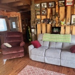 Cabin rental amenities include dining area, dishwasher, gas stove, refrigerator, and other must-have kitchen essentials.